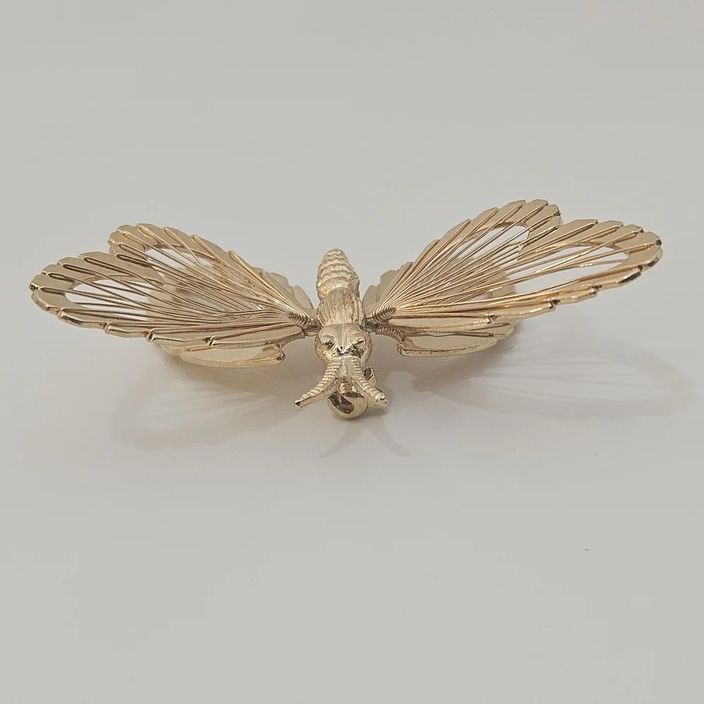 Vintage Monet gold tone butterfly brooch signed